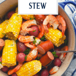 Overhead shot of a pot of Frogmore Stew with text title overlay