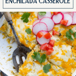 Serving spoon in chicken enchilada casserole with text title box at top
