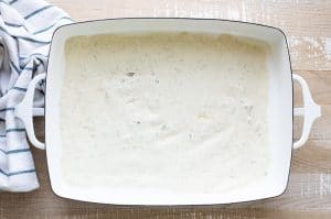 Sour cream sauce in a white dish