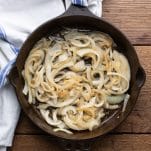 Sauteed onions in a skillet