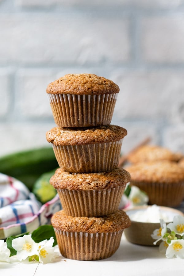 Side shot of a stack of easy zucchini muffins.