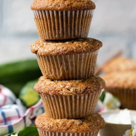 Close up shot of a stack of homemade easy zucchini muffins.