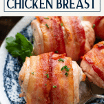 Close up front shot of baked bacon wrapped chicken with text title box at top