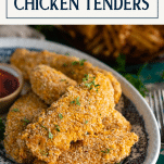 Close up front shot of a plate of homemade baked chicken tenders with text title box at top