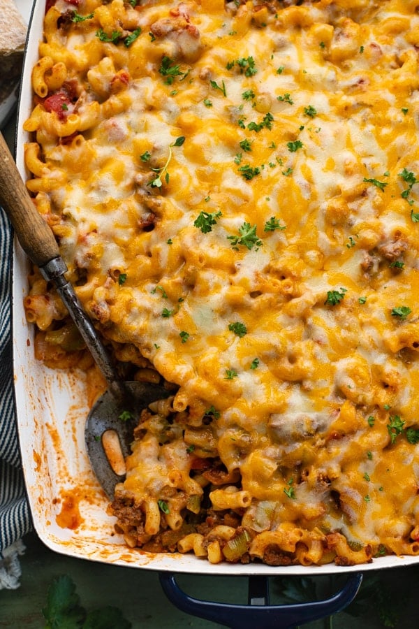 Close up overhead shot of beefy noodle casserole with cheese on top