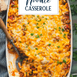 Beef noodle casserole with text title overlay
