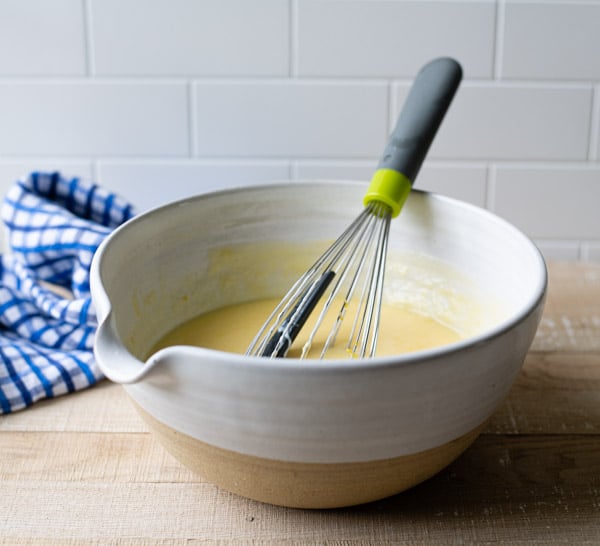 Filling for lemon buttermilk pie in a mixing bowl