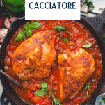 Overhead image of chicken cacciatore in a skillet with text title overlay