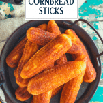 Overhead shot of a tray of cornbread sticks with text title overlay