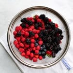Fresh summer berries in a colander