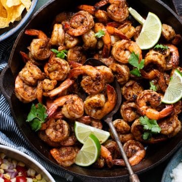 Overhead shot of a skillet full of spicy Mexican shrimp