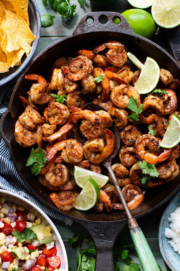 Overhead shot of a skillet full of spicy Mexican shrimp