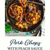 Pork chops with peach sauce and text title at the bottom.