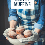 Hands holding a bowl of apple cider donut muffins with text title overlay