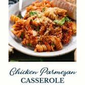 Chicken parmesan casserole with text title at the bottom.
