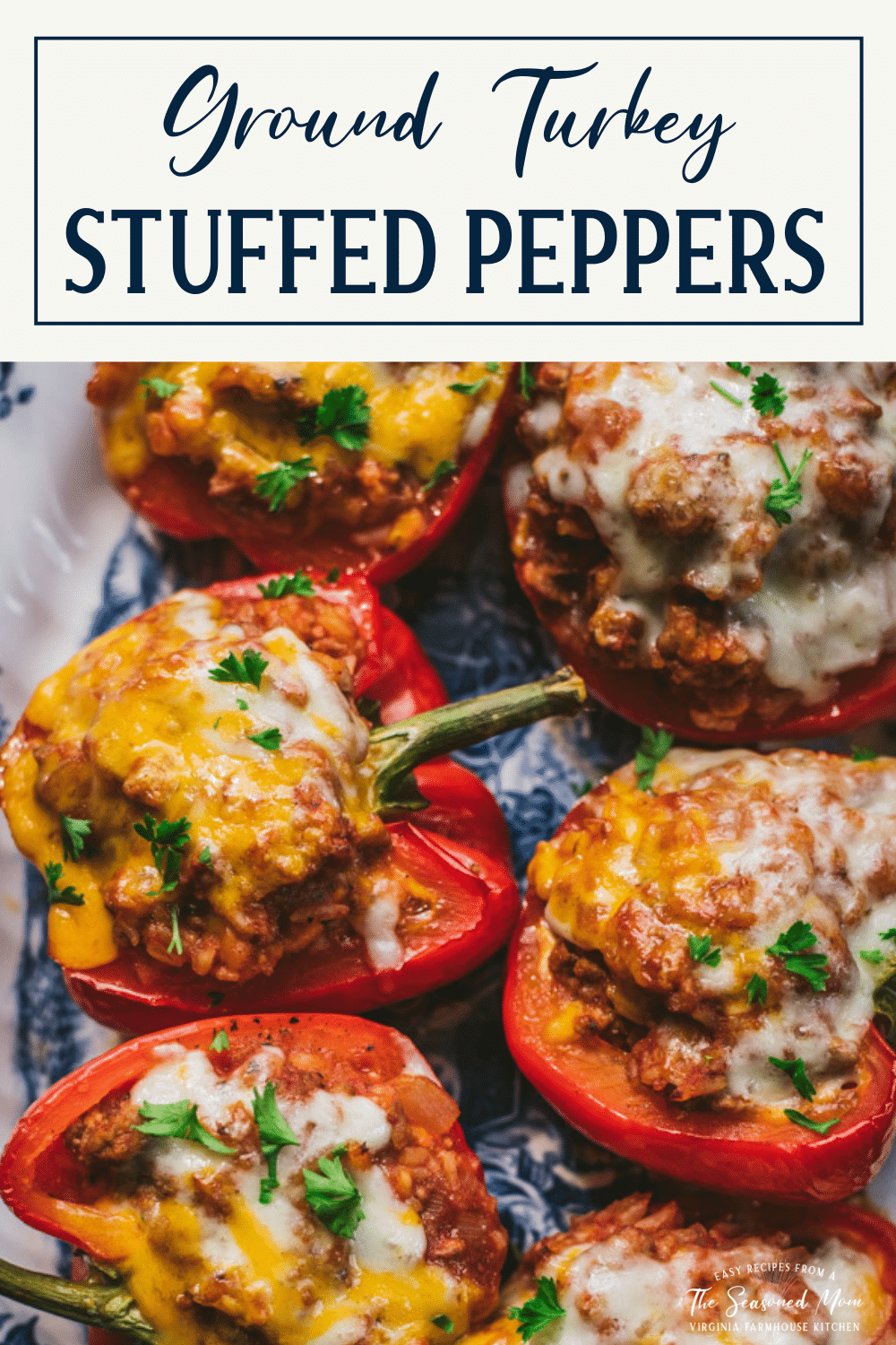 Close overhead image of stuffed bell pepper recipe with ground turkey and text title box at top