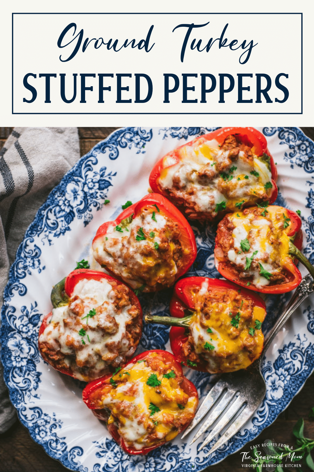 Close overhead image of a platter of ground turkey stuffed peppers with rice and text title box at top
