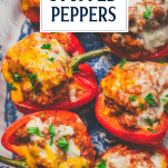 Close overhead shot of stuffed peppers with ground turkey and text title overlay