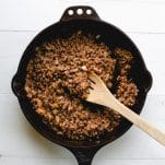 Ground taco meat in a cast iron skillet