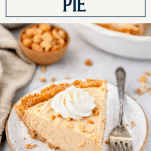 Slice of homemade peanut butter pie on a white plate with text title box at top