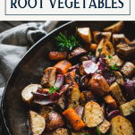 Close up shot of pan roasted root vegetables with text title box at top