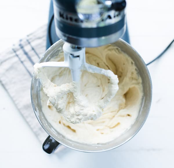 Vanilla cake batter in a mixing bowl