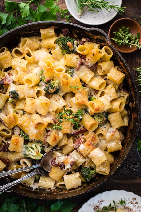 Overhead image of rigatoni pasta bake with bacon broccoli and cheese.