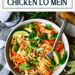 Overhead image of a bowl of the best chicken lo mein recipe with text title box at top