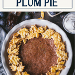 Overhead shot of a damson pie with text title box at top