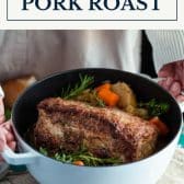 Dutch oven pork roast with gravy and text title box at top.
