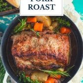 Dutch oven pork roast with gravy and text title overlay.