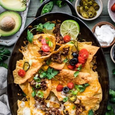 Square featured image of a pan of homemade nachos with ground beef