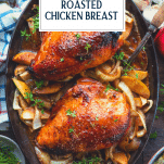 Pan of golden brown apple cider baked chicken breast with text title overlay