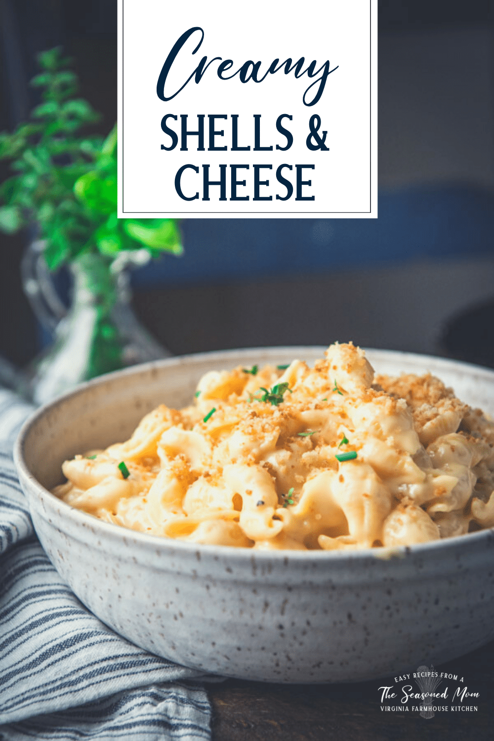 Close up side shot of a big bowl of mac and cheese shells recipe with text title overlay