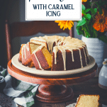 Side shot of a sliced pound cake on a cake stand with text title overlay