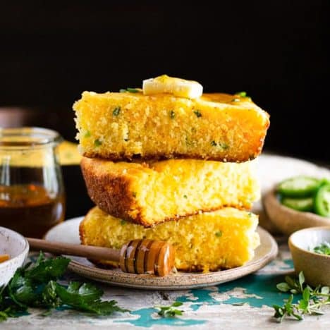 Slices of jalapeno cheddar mexican cornbread on a plate.
