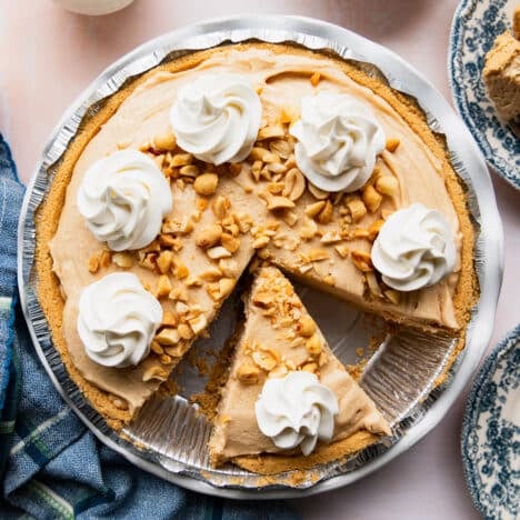 Square overhead shot of a sliced no bake peanut butter pie.