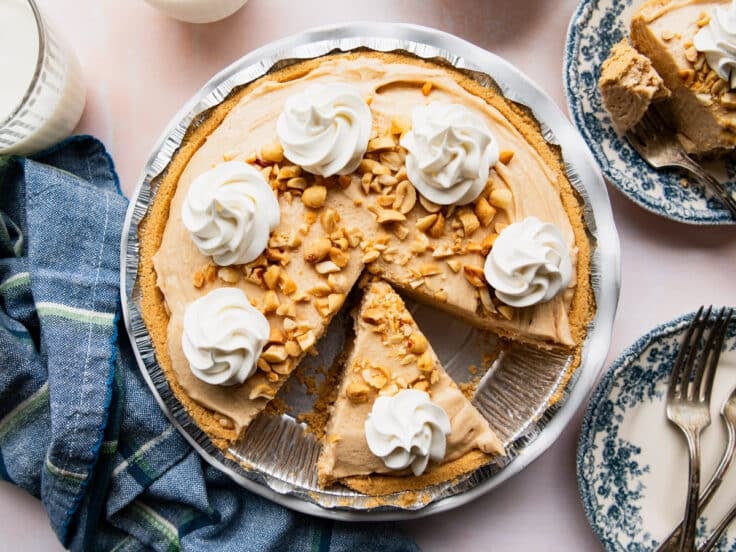 Horizontal overhead shot of a sliced no bake peanut butter pie.