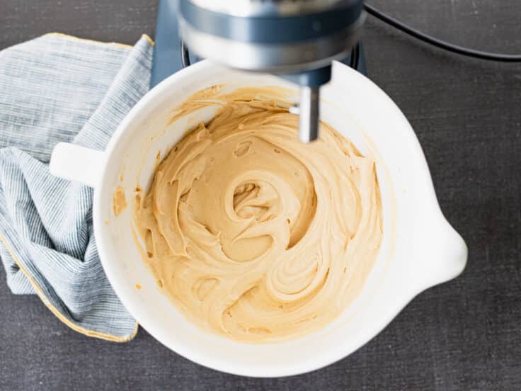 Mixing the filling in a stand mixer for a peanut butter pie.