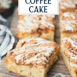 Close up shot of sliced apple coffee cake with text title overlay