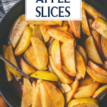 Overhead shot of baked apple slices in a pan with text title overlay