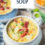 Close up shot of a bowl of bacon cheeseburger soup with text title overlay
