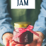 Hands gifting a jar of Christmas jam with text title overlay