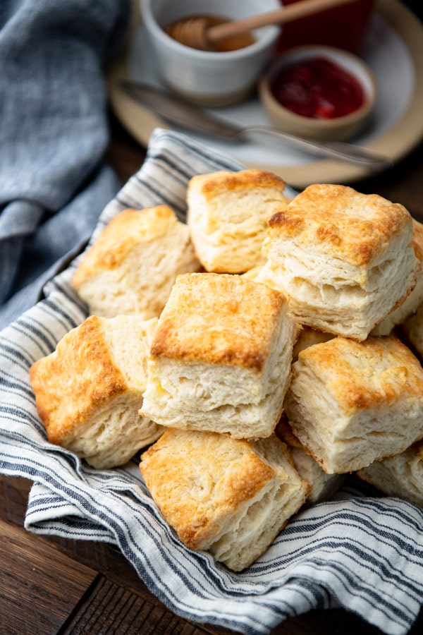 Close up shot of a basket of the best buttermilk biscuit recipe
