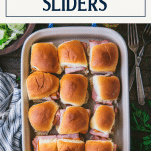 Overhead image of a pan of easy ham and cheese sliders with text title box at top