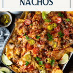 Overhead image of leftover pulled pork nachos with text title box at top