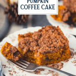 Close up shot of a piece of easy pumpkin coffee cake with text title overlay