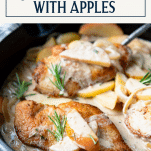 Overhead image of creamy Dijon chicken in a skillet with apples and text title overlay