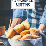 Hands serving a basket of sweet cornbread muffins with text title overlay