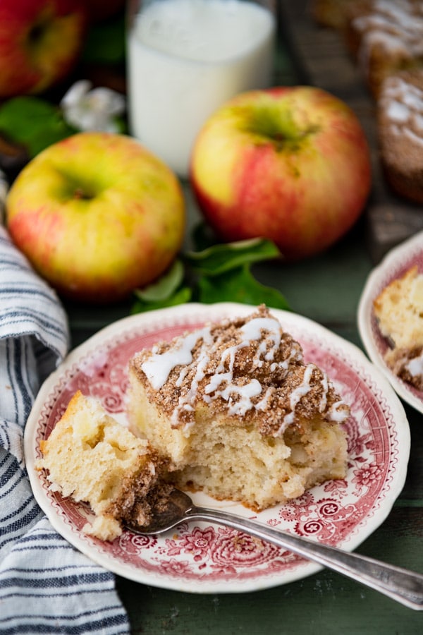 The best apple coffee cake recipe served on a table with fresh apples in the background